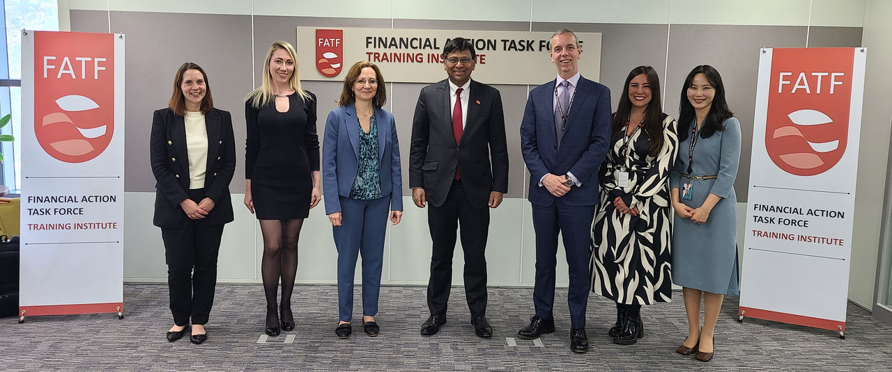 Staff of the FATF Training Institute Busan with FATF Executive Secretary Violaine Clerc and FATF President T. Raja Kumar